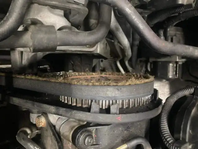 Does a failing timing belt show symptoms? If so, what are they?