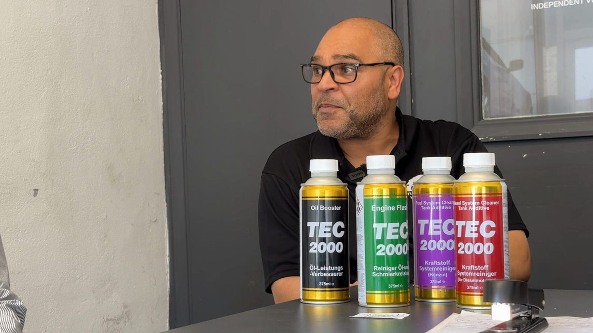 Sean of Turner Automotive in Twickenham behind four cans of TEC 2000