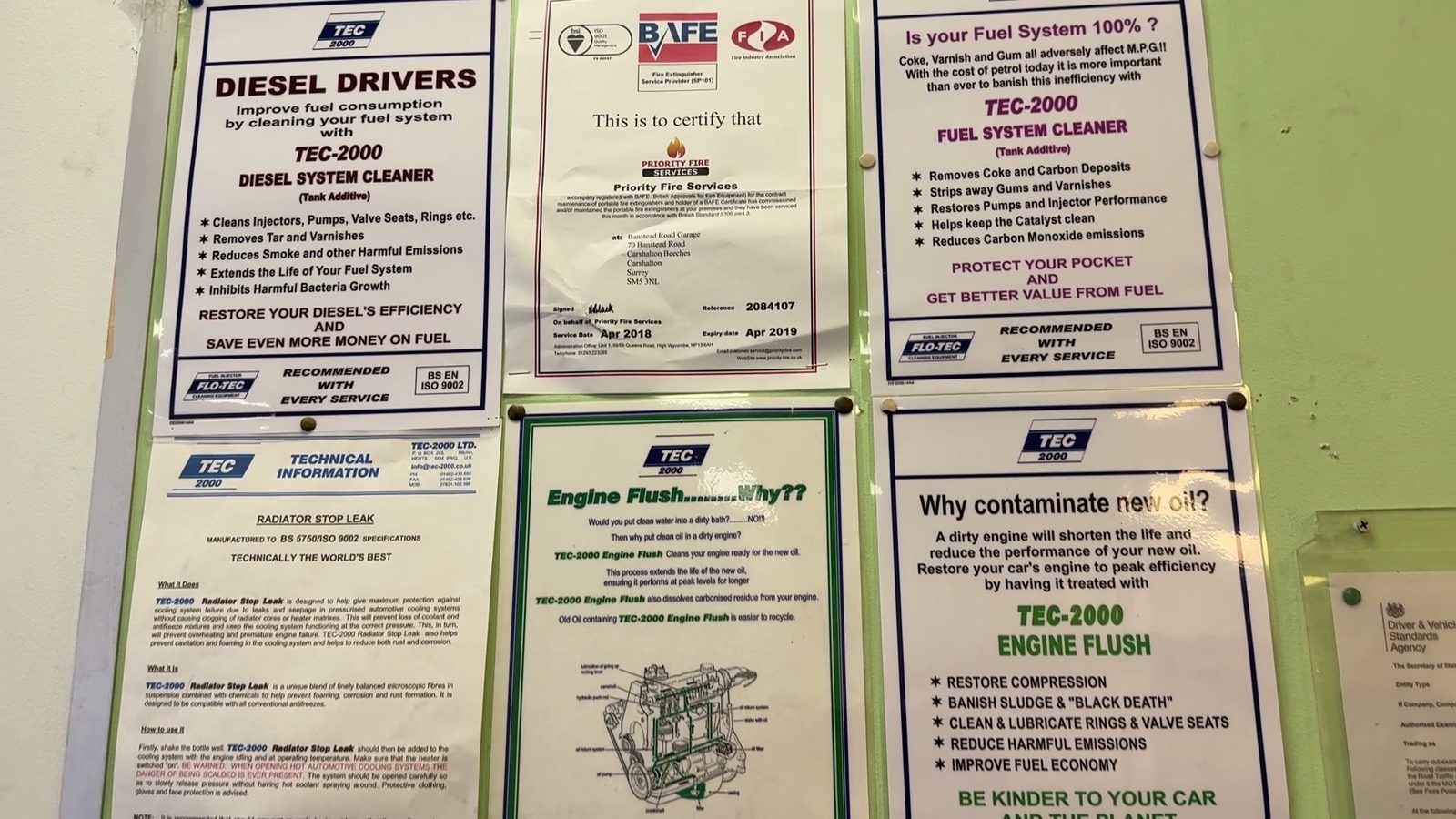 TEC 2000 posters on the wall of the MOT reception, which Dave shows to customers who ask about the additives.