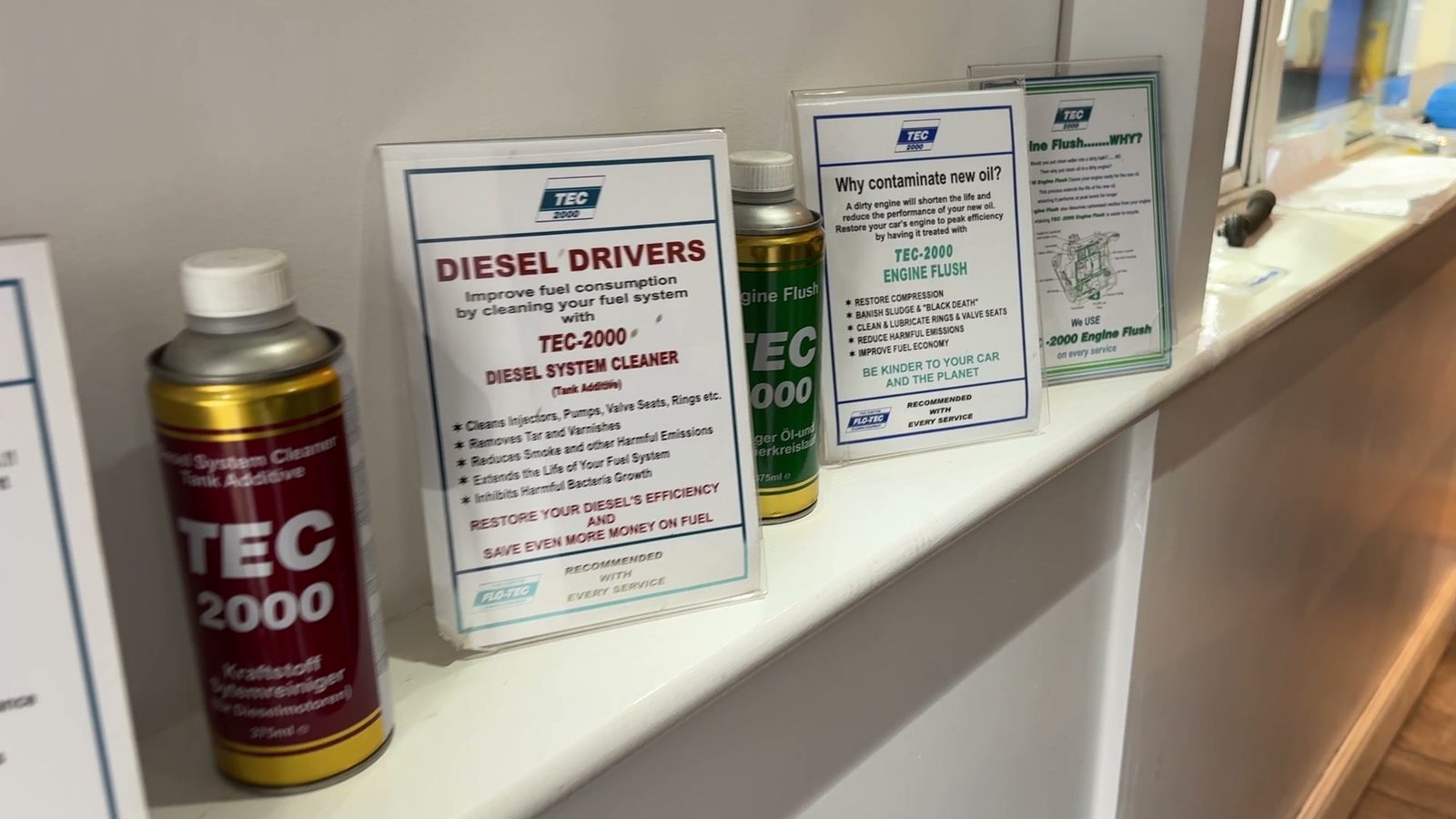 TEC 2000 Diesel System Cleaner and Engine Flush on display at Fallsbrook Motors, with TEC 2000 information cards.