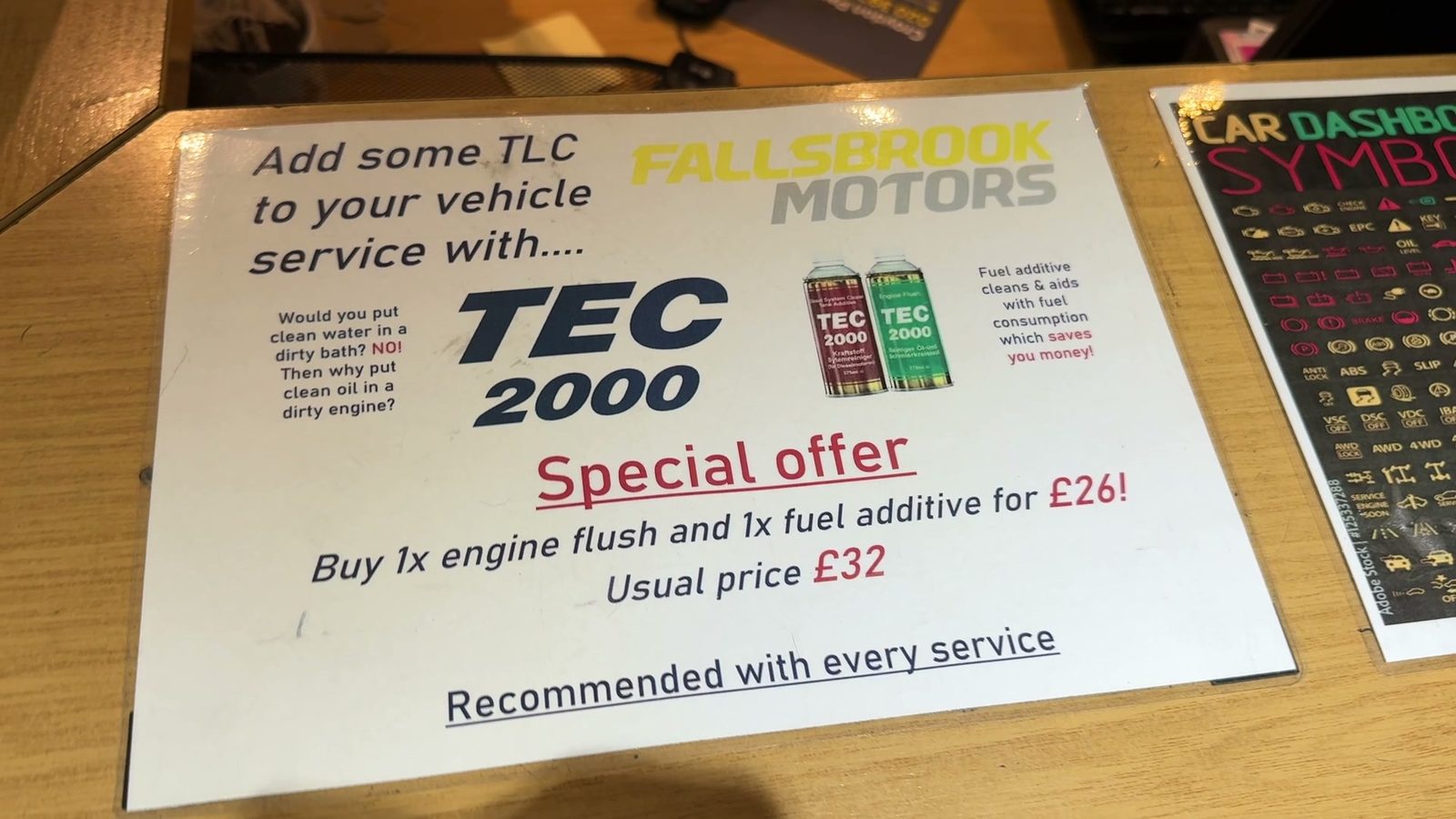 The TEC 2000 service offer at the Fallsbrook Motors counter, pictured with a Diesel System Cleaner can and an Engine Flush can.