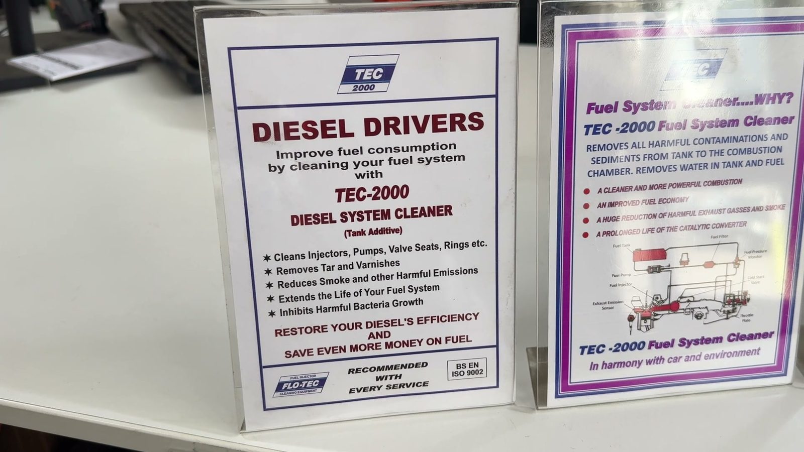 TEC 2000 Diesel System Cleaner and Fuel System Cleaner information boards in The Test Station office.